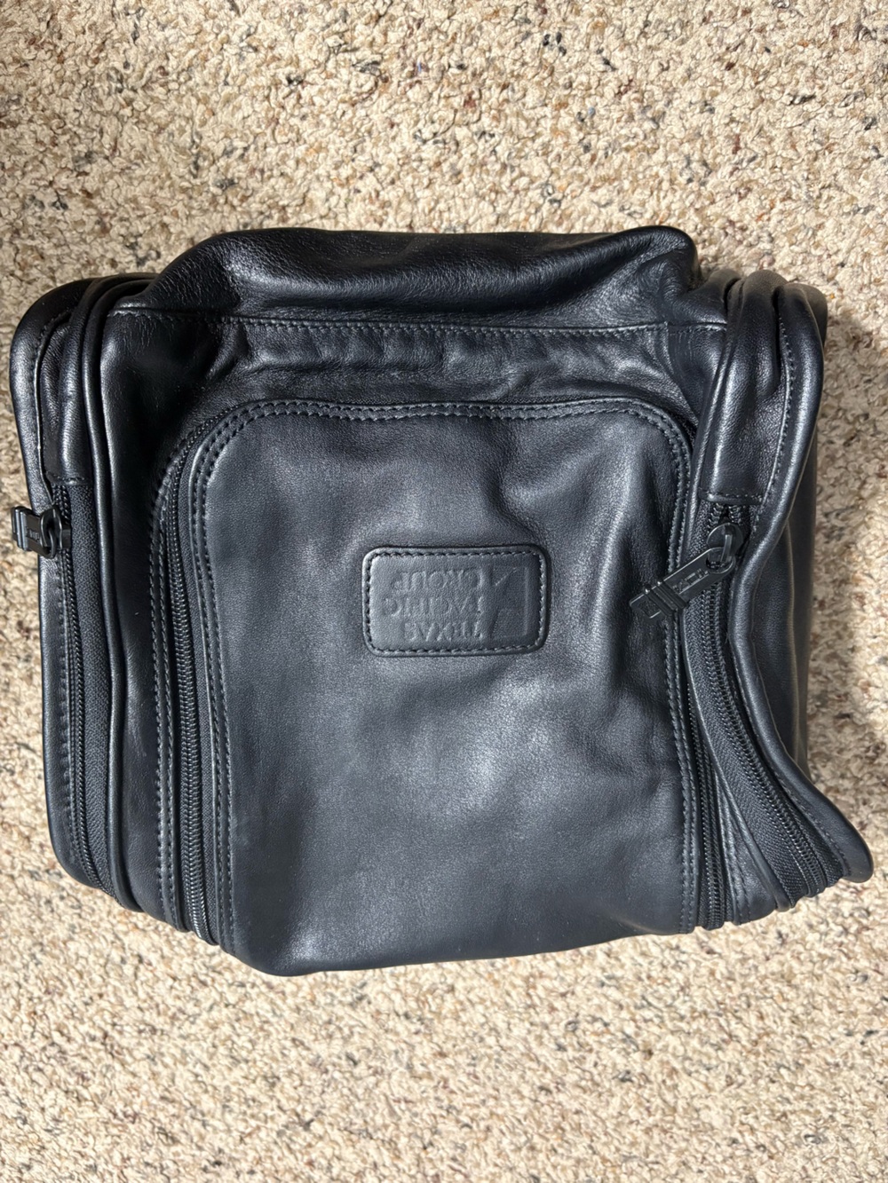 Tumi vintage Black Leather Toiletry.